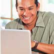 Aboriginal male searches for TD jobs online.