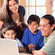 Aboriginal family finding personal TD banking and investing services online.
